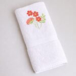 TOALLA DE ROSTRO BORDADA RAMILLETE 2 CORAL